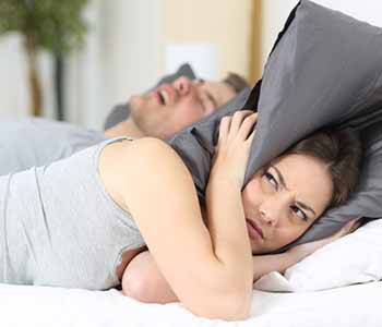 Couple suffering from sleep apnea problem